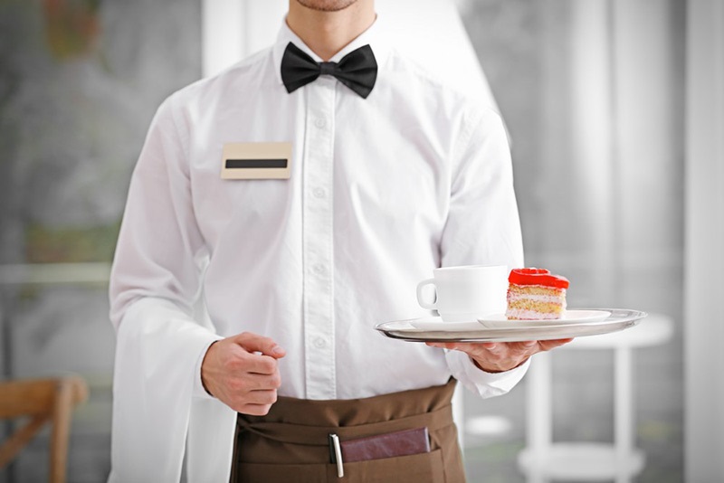 waiter holding a tray